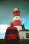 Happisburgh's striped lighthouse and Rik Middleton in similar theme